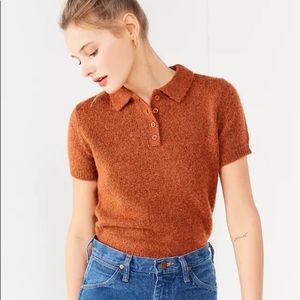 Shrunken orange polo sweater from Urban Outfitters!